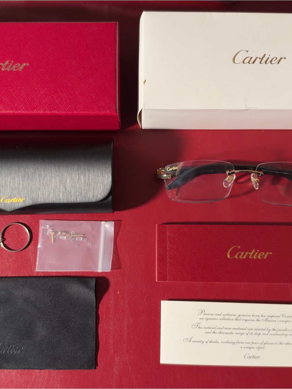 Cartier white buffalo horns glasses with box and papers